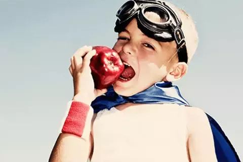boy eating apple
